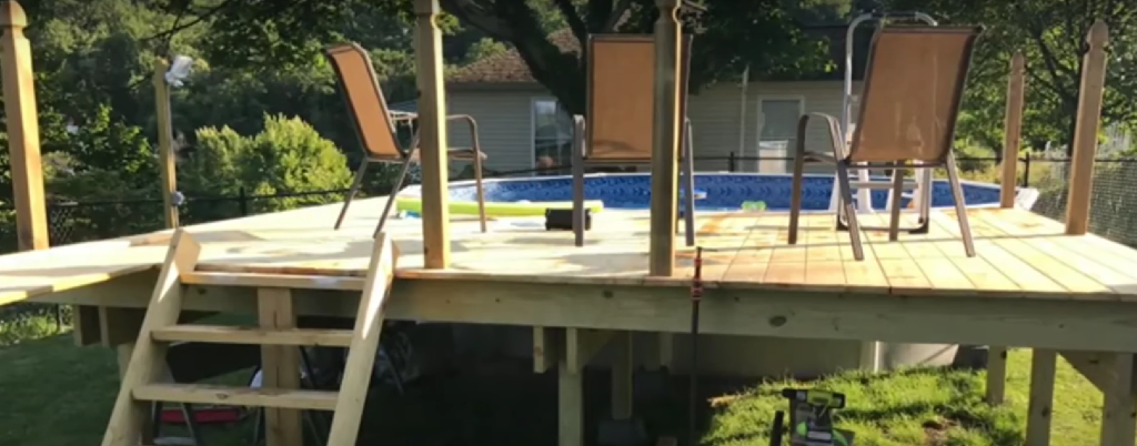 Lay floorboards and cut off the excess wood.